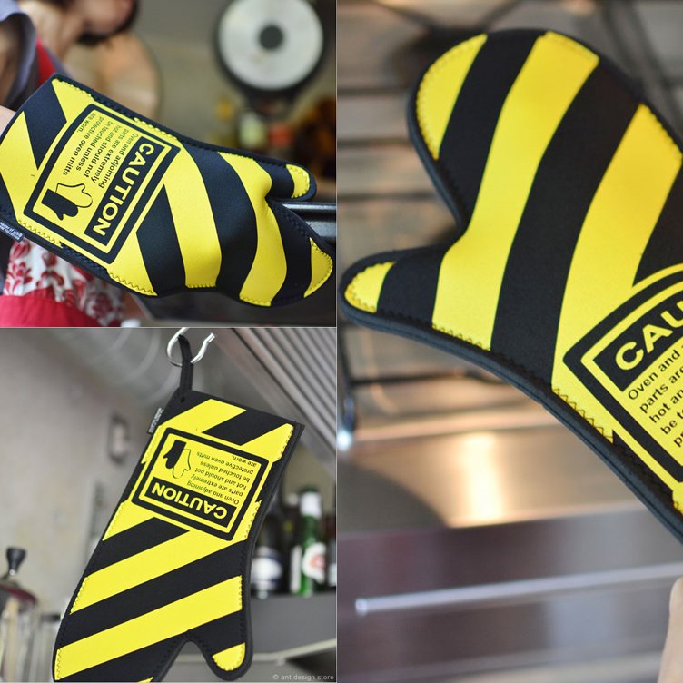 funny caution oven mitt